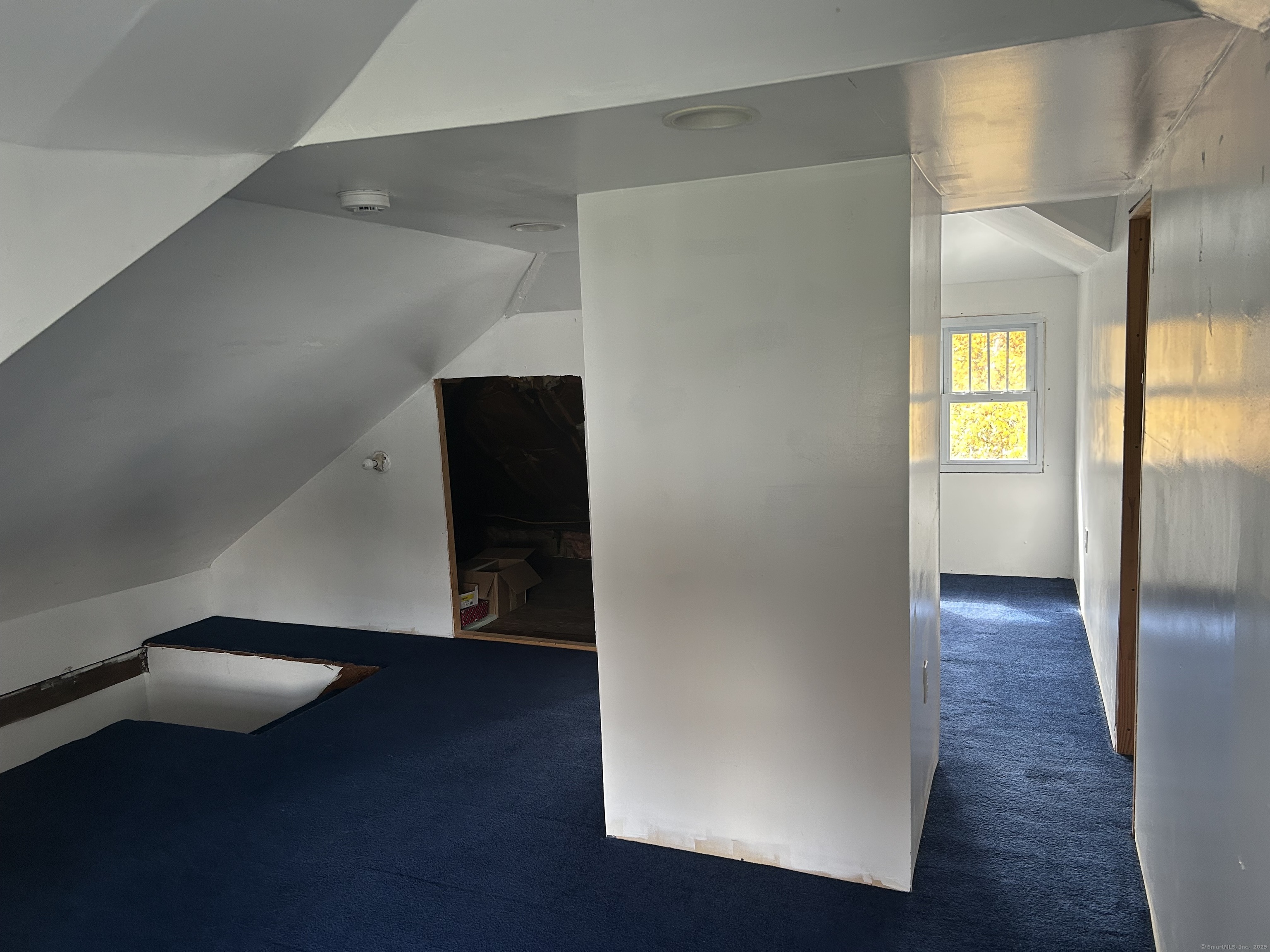 21 Acushnet Street Naugatuck, CT 06770 - Photo 14 of 27 an empty room with wooden floor and windows