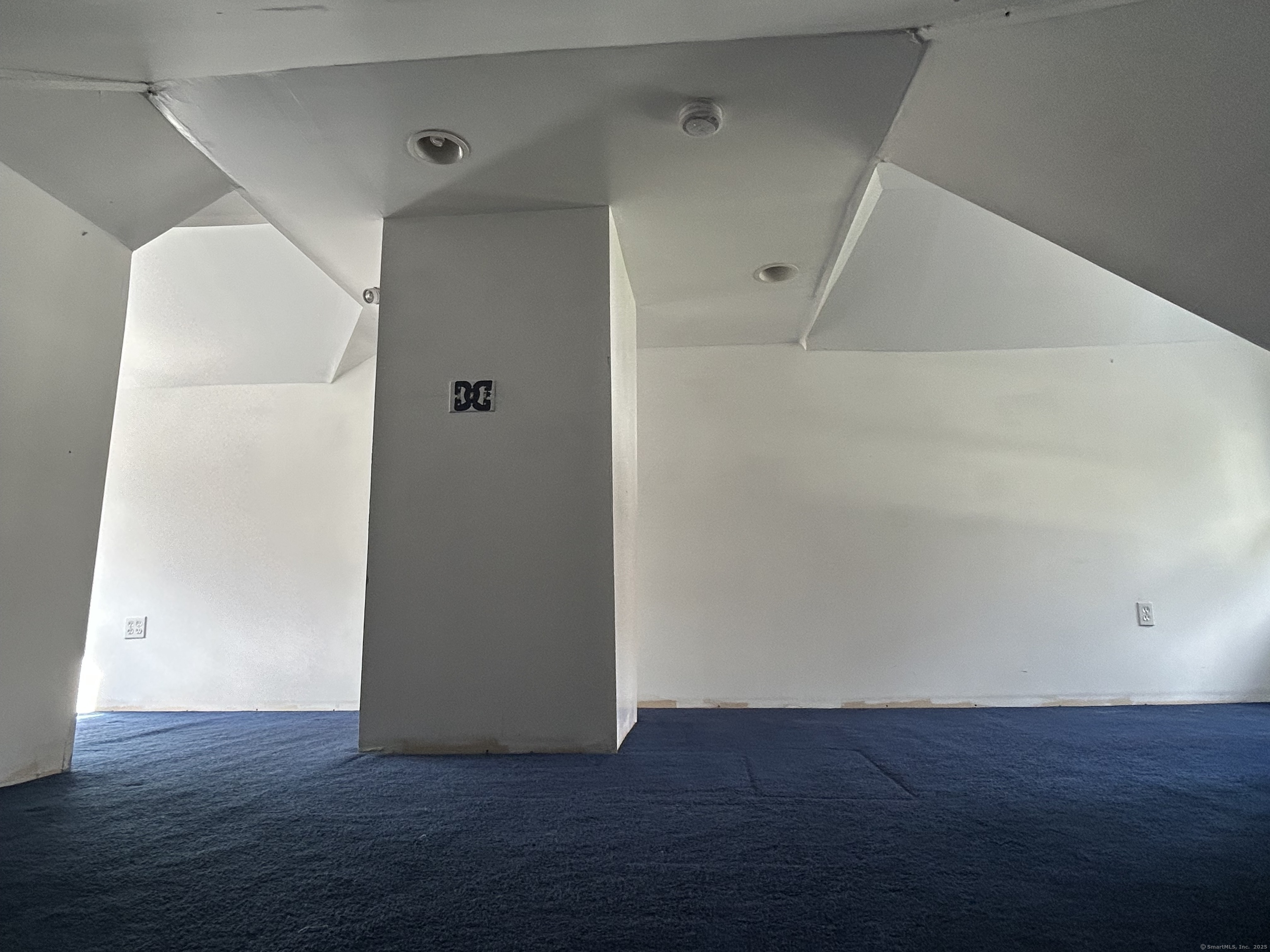 21 Acushnet Street Naugatuck, CT 06770 - Photo 15 of 27 a view of an empty room with wooden floor and a window