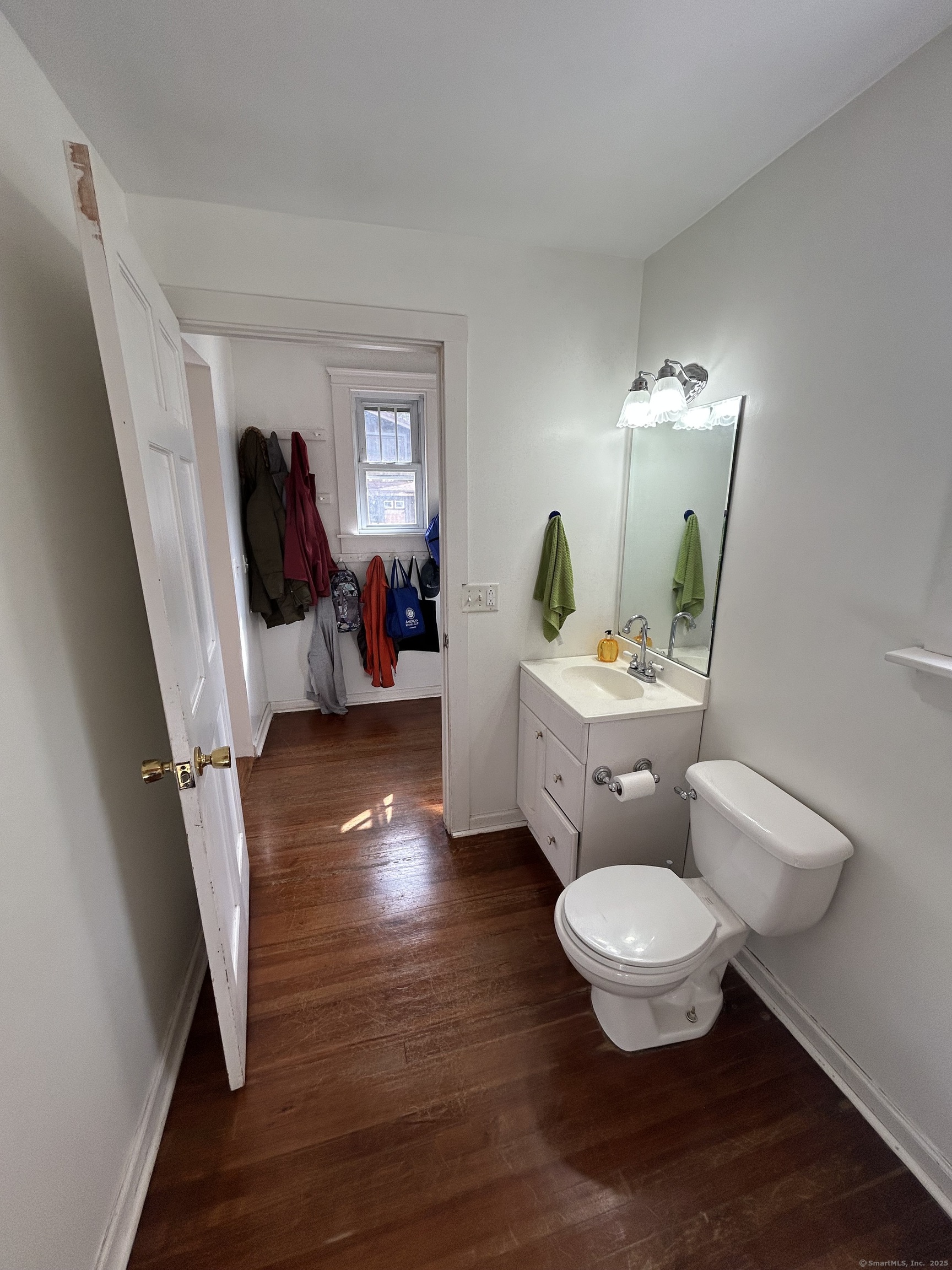 21 Acushnet Street Naugatuck, CT 06770 - Photo 17 of 27 a living room with furniture and a wooden floor