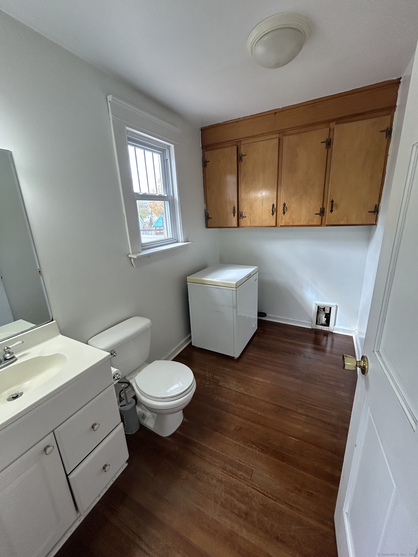 21 Acushnet Street Naugatuck, CT 06770 - Photo 18 of 27 a bathroom with a sink and a mirror