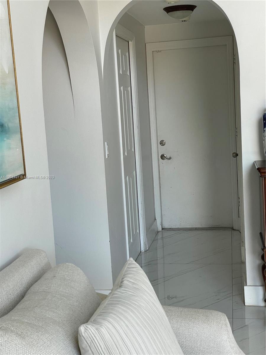 15542 Southwest 148th Terrace Miami, FL 33196 - Photo 16 of 38 a bedroom with a bed and a mirror