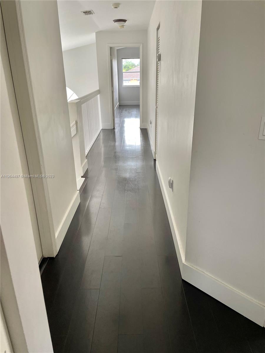 15542 Southwest 148th Terrace Miami, FL 33196 - Photo 26 of 38 a view of a hallway