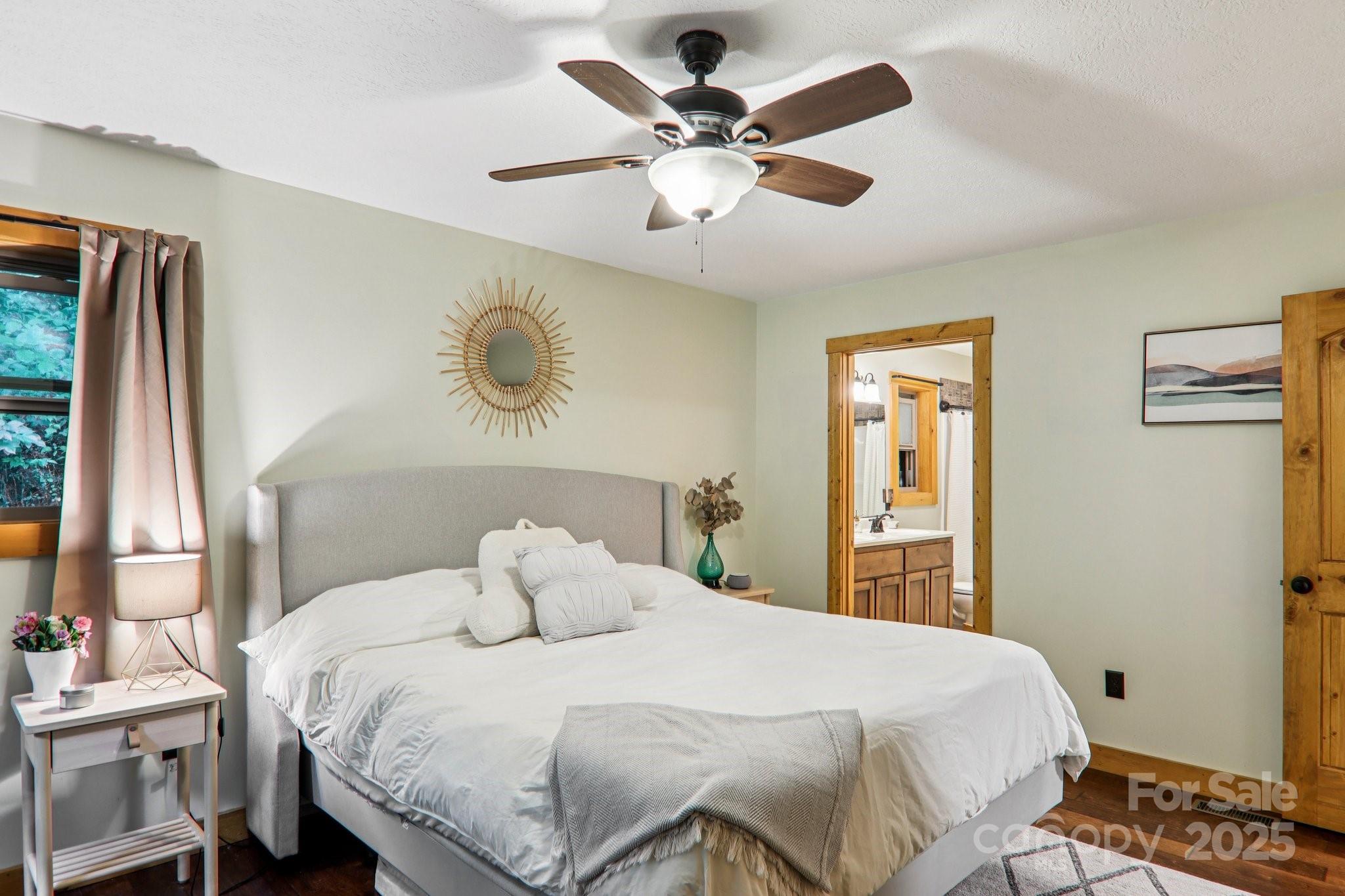 2171 Black Rock Road Cherokee, NC 28719 - Photo 14 of 36 a bedroom with a bed and a window