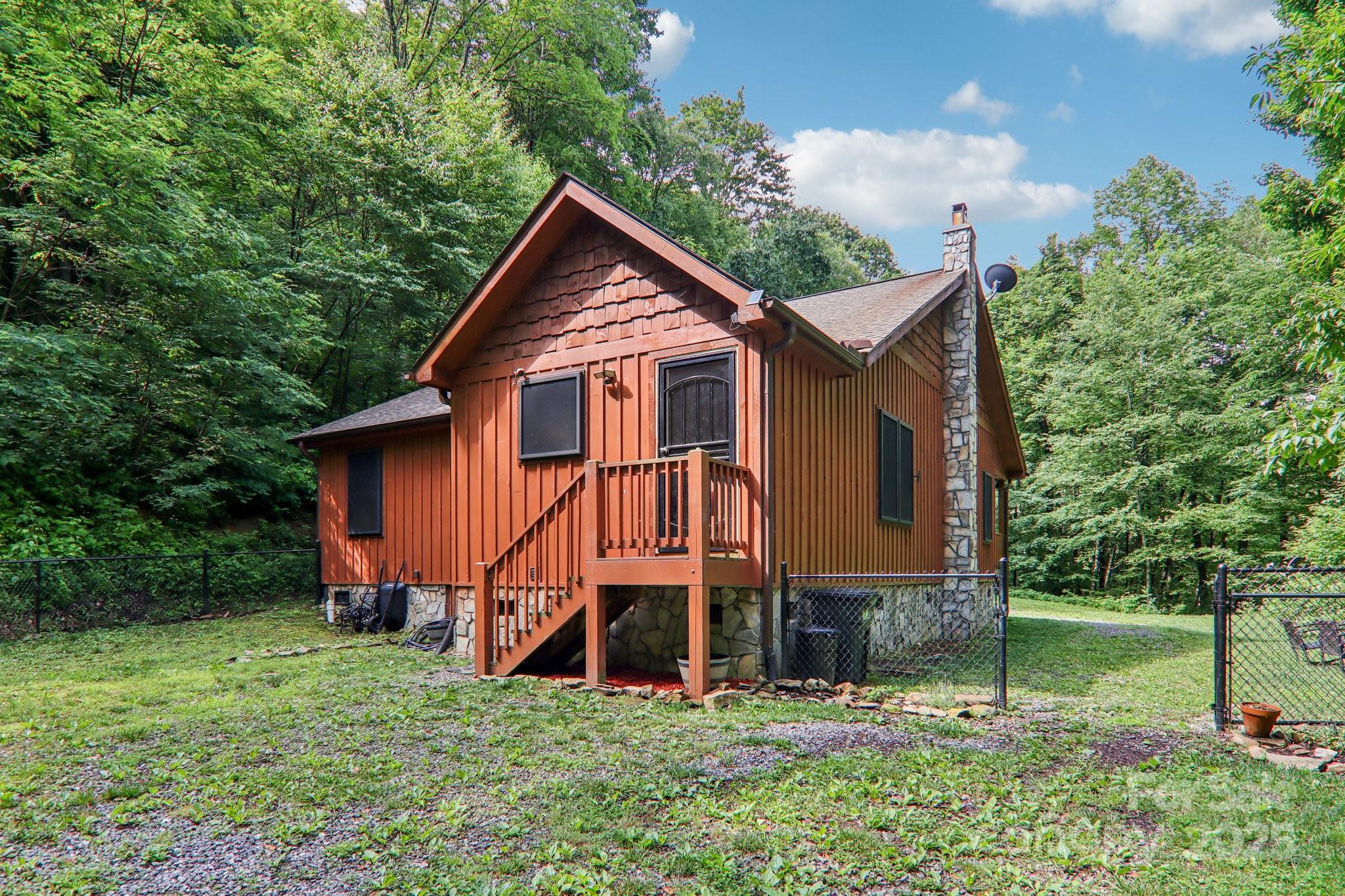 2171 Black Rock Road Cherokee, NC 28719 - Photo 27 of 36 front view of a house with a yard