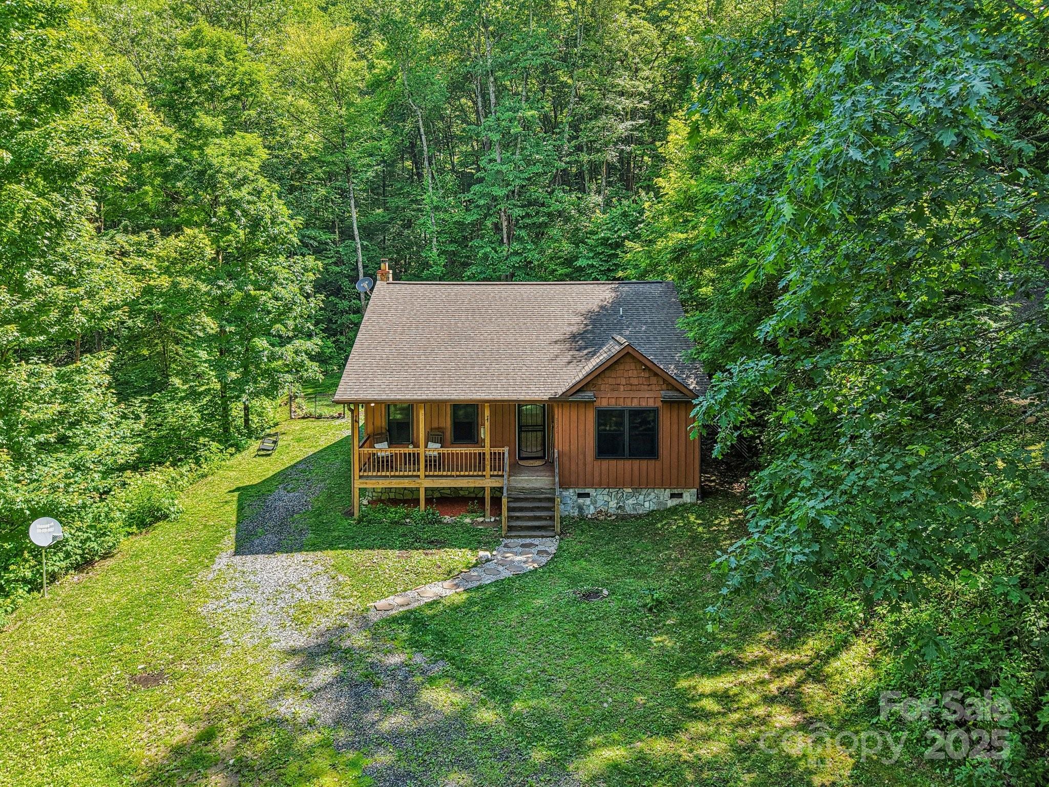 2171 Black Rock Road Cherokee, NC 28719 - Photo 33 of 36 aerial view of a house with a yard table and chairs