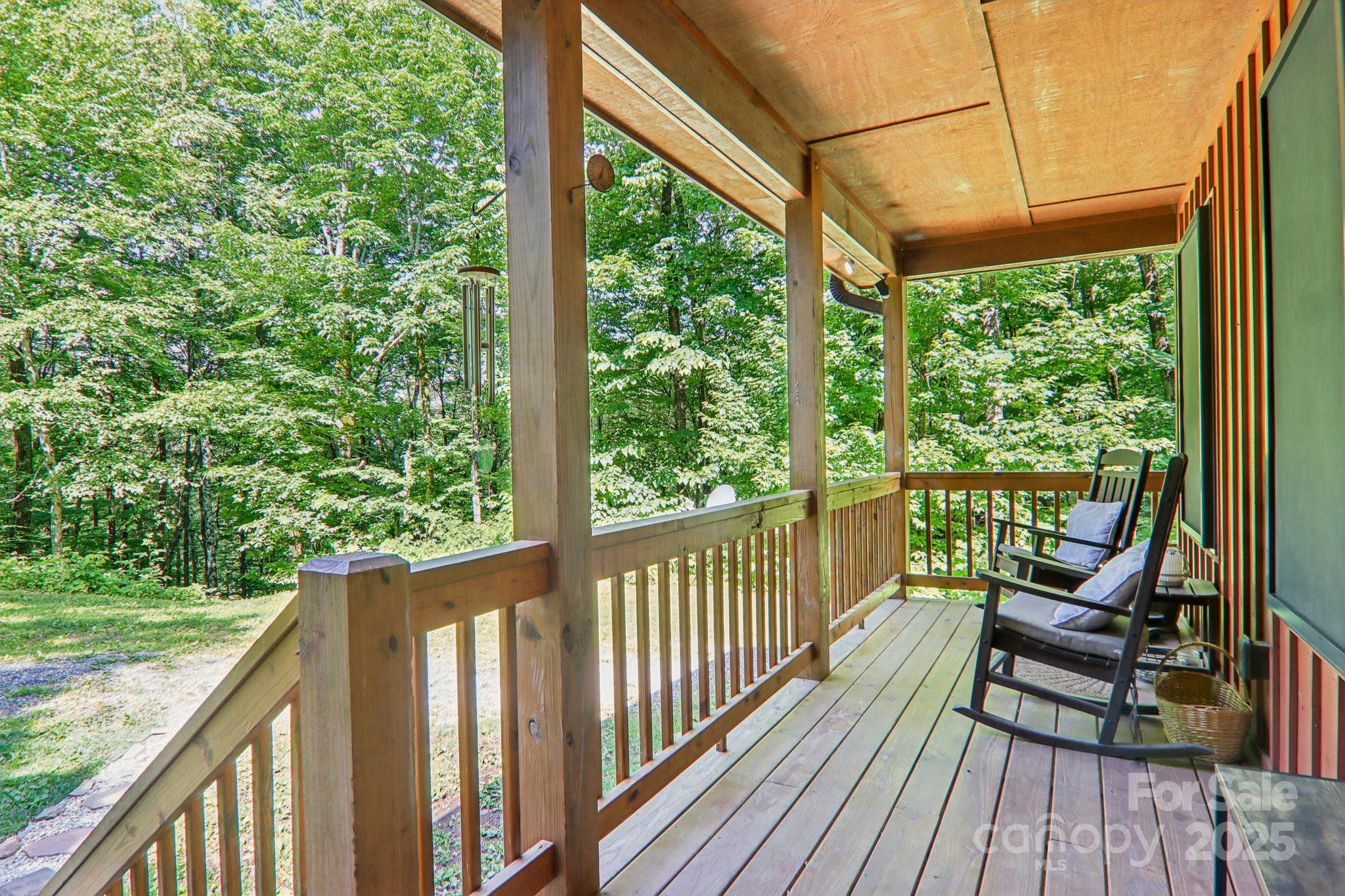 2171 Black Rock Road Cherokee, NC 28719 - Photo 4 of 36 a view of a two chairs in the balcony
