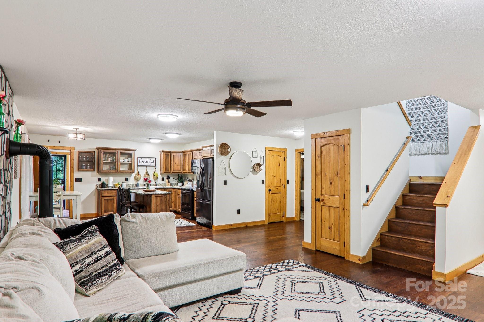 2171 Black Rock Road Cherokee, NC 28719 - Photo 7 of 36 a living room with furniture and wooden floor