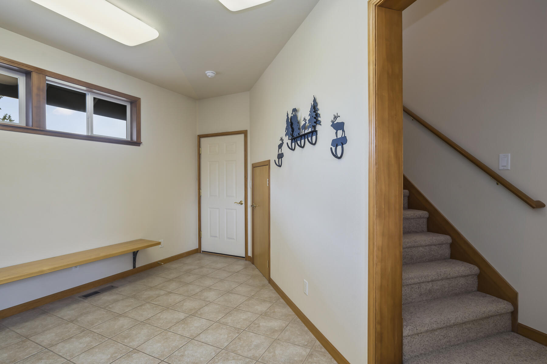 60850 Jennings Road Bend, OR 97702 - Photo 31 of 52 a view of entryway with a window and stairs