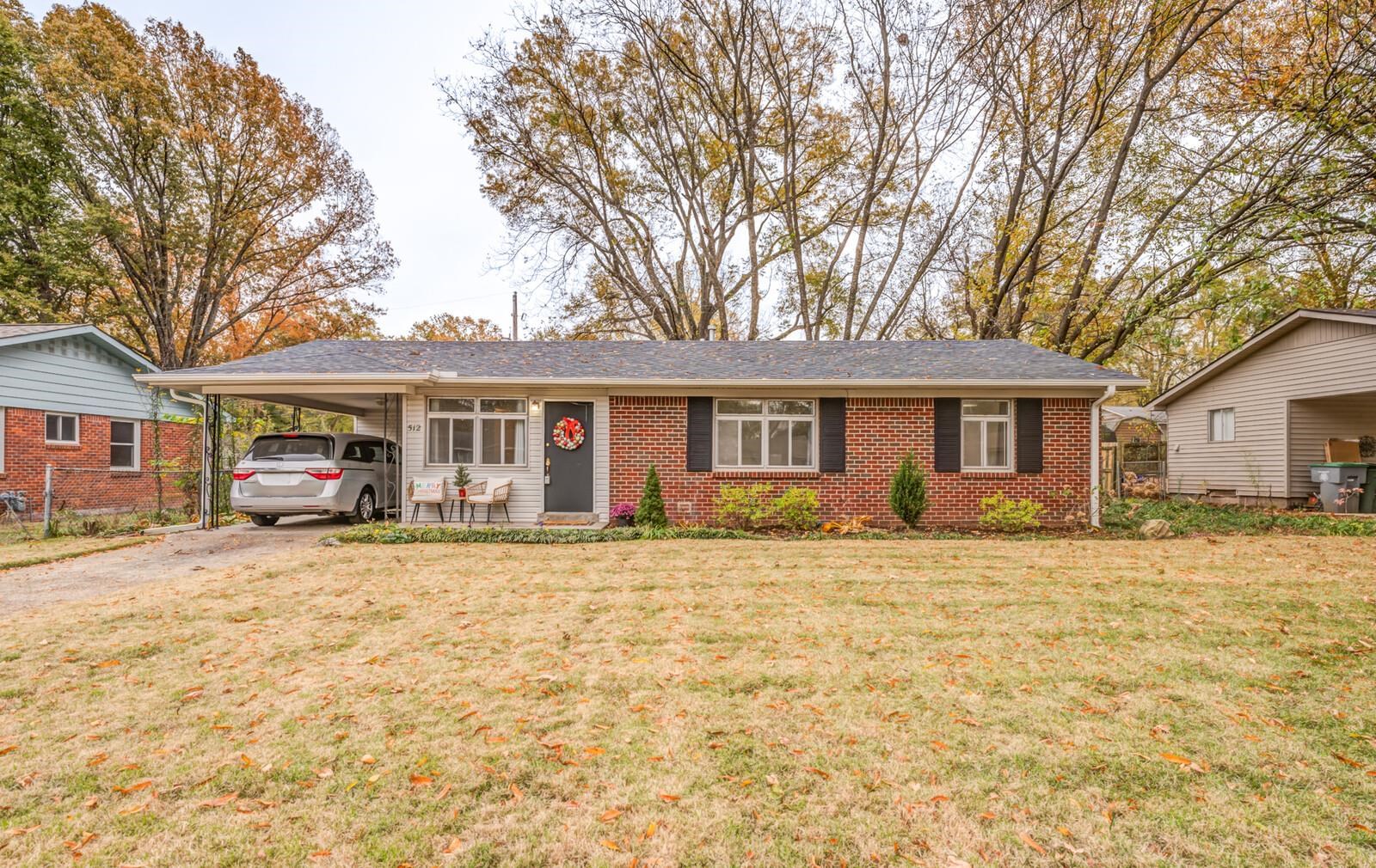 512 Fleda Road Memphis, TN 38120 - Photo 1 of 26 a front view of a house with a patio