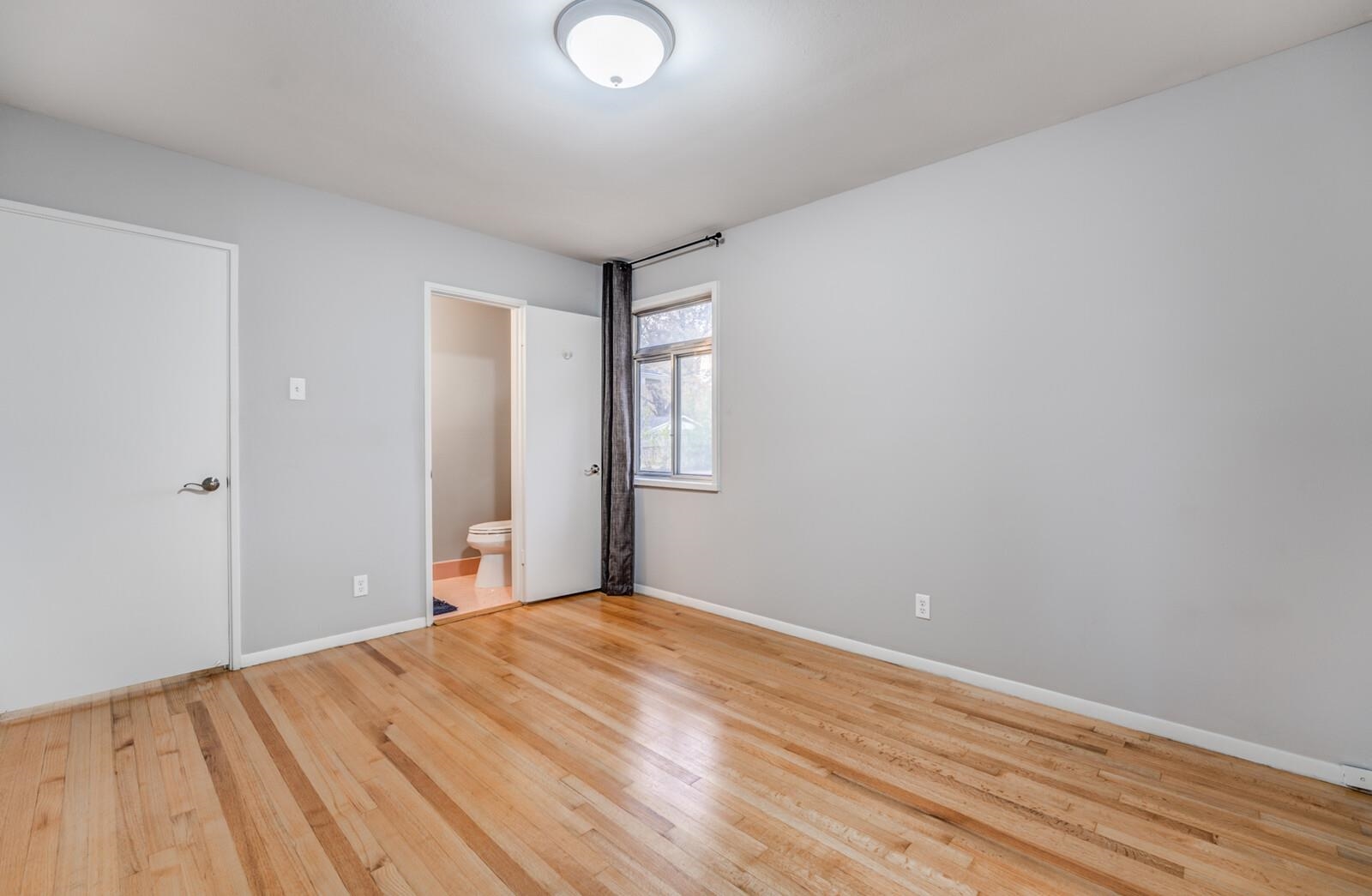 512 Fleda Road Memphis, TN 38120 - Photo 15 of 26 a view of empty room with wooden floor