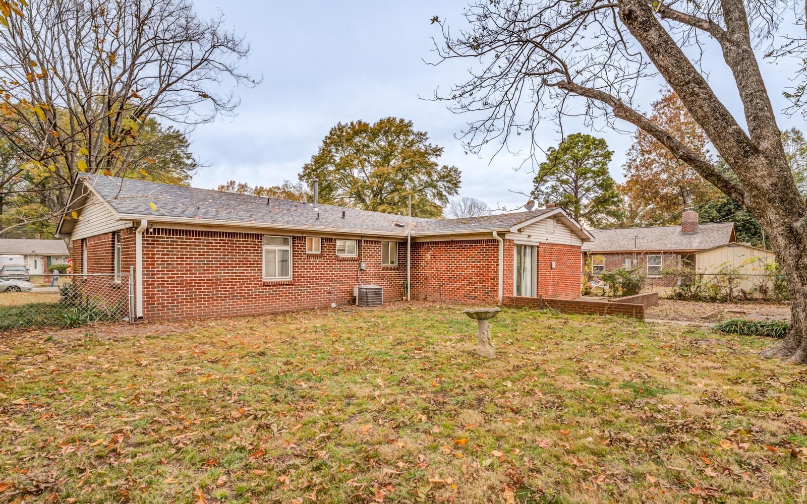 512 Fleda Road Memphis, TN 38120 - Photo 24 of 26 front view of a house with a yard