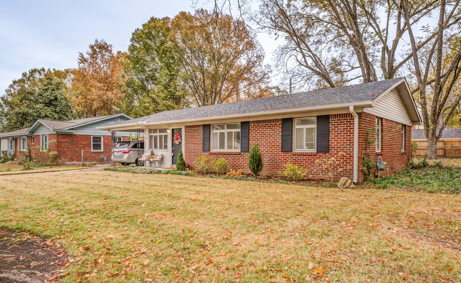 512 Fleda Road Memphis, TN 38120 - Photo 26 of 26 a front view of a house with a yard