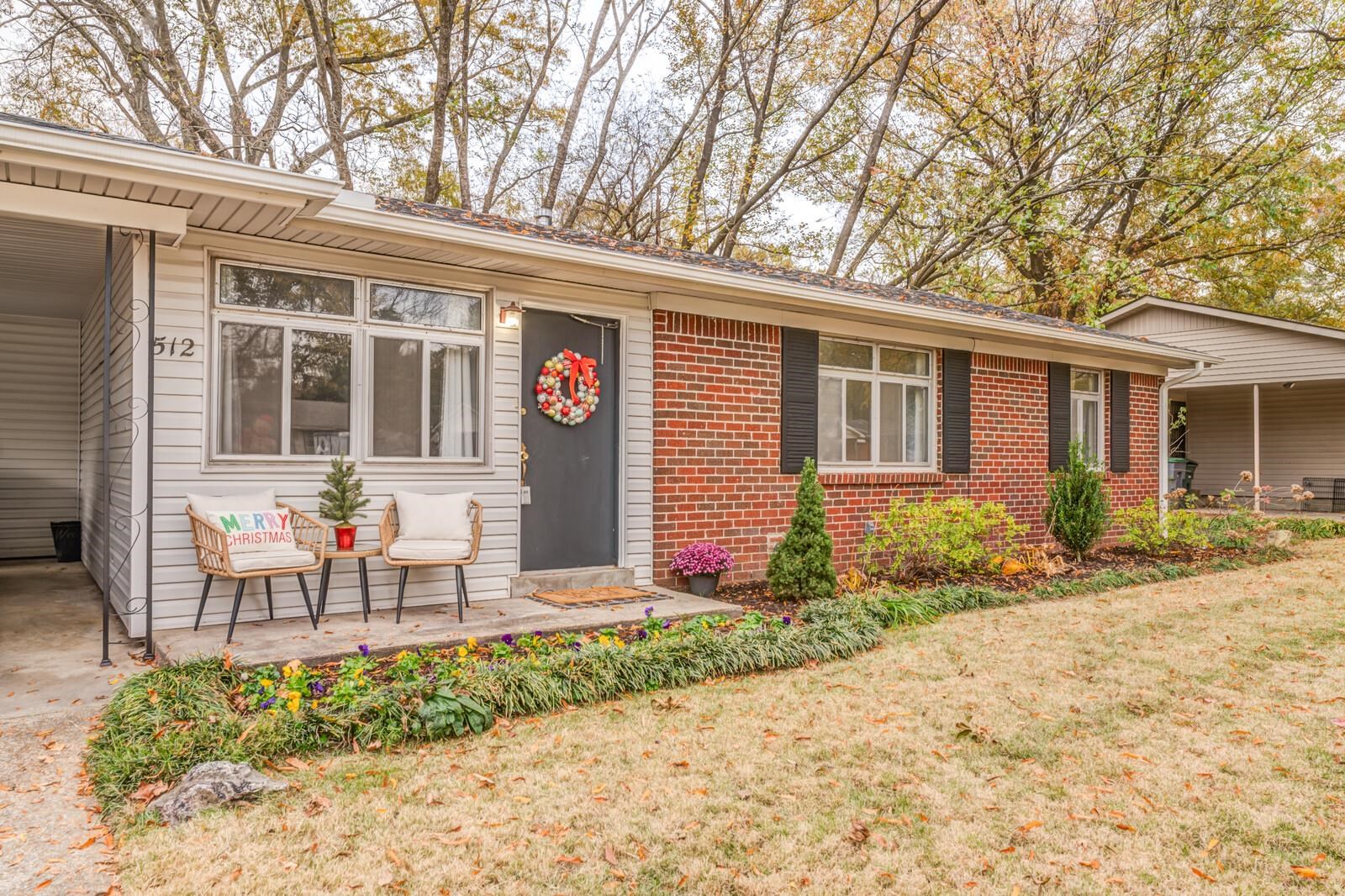 512 Fleda Road Memphis, TN 38120 - Photo 3 of 26 a view of a house with backyard and chairs