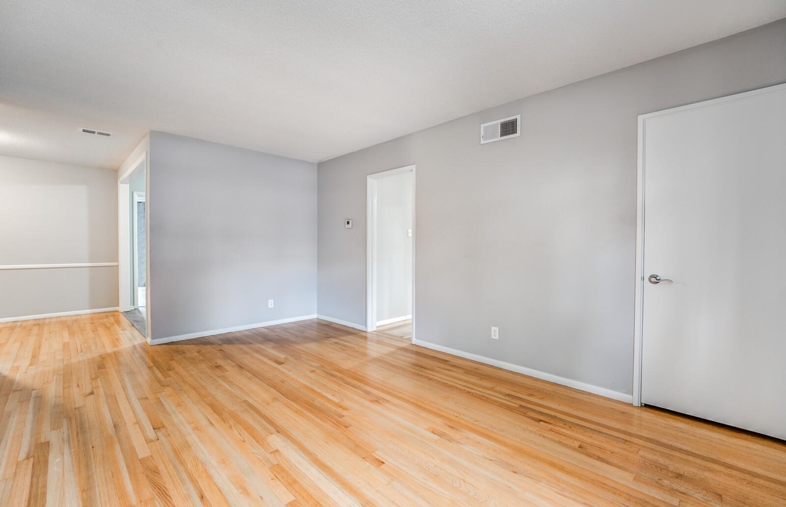 512 Fleda Road Memphis, TN 38120 - Photo 6 of 26 a view of empty room with wooden floor
