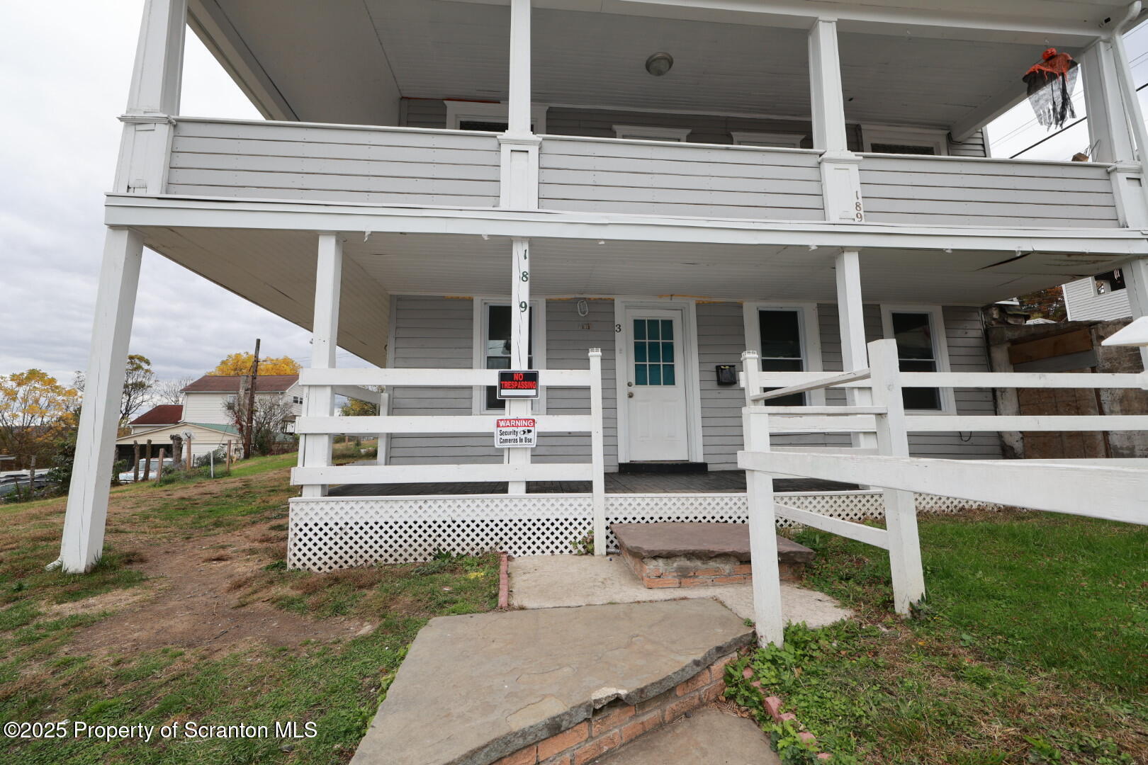 189 Nottingham Street, Unit 3 Plymouth, PA 18651 - Photo 2 of 14 a view of a house with backyard porch and furniture