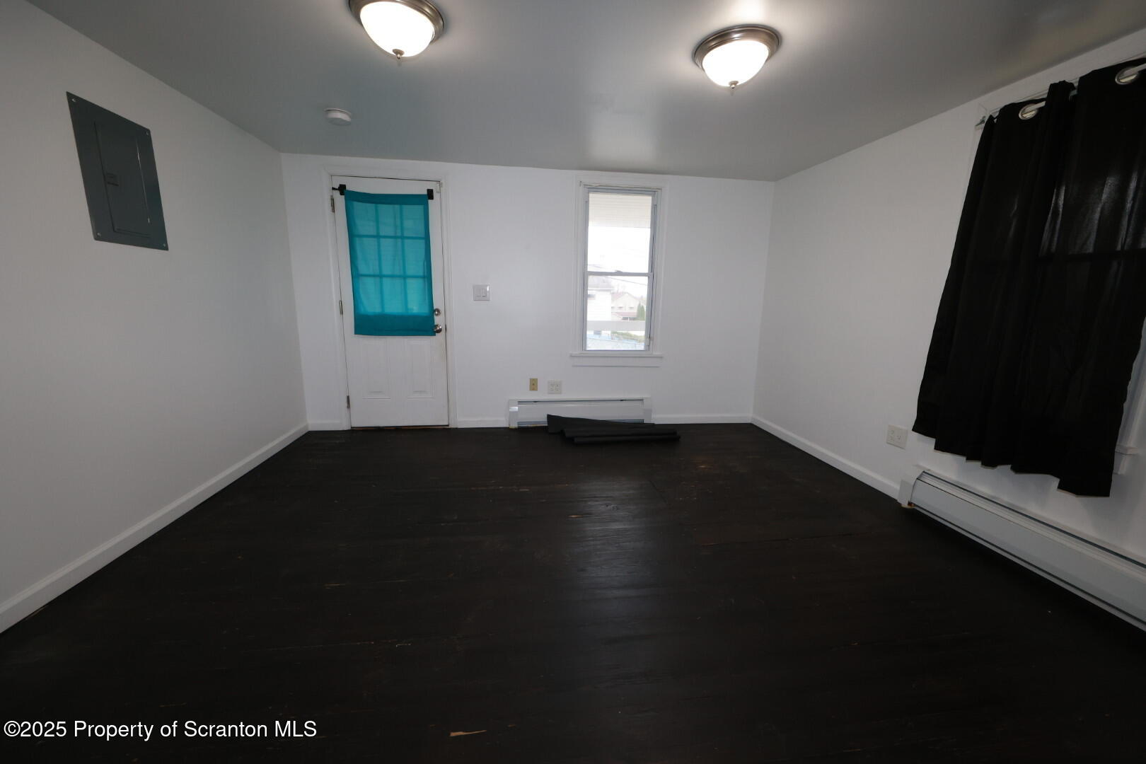 189 Nottingham Street, Unit 3 Plymouth, PA 18651 - Photo 5 of 14 a view of room with window and hardwood floor