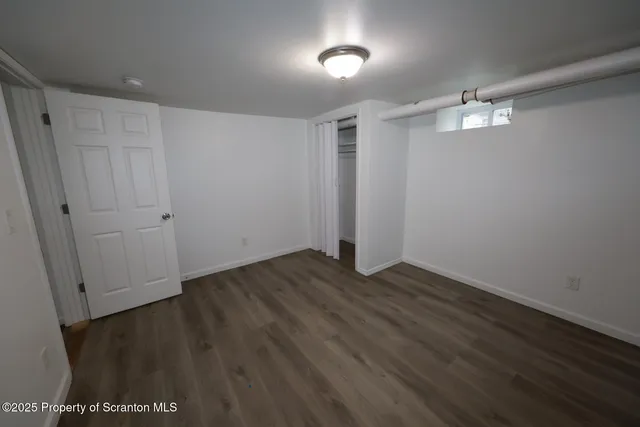 an empty room with a workbench