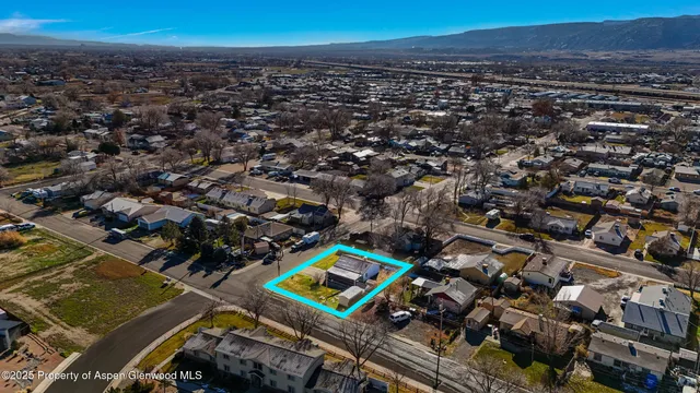 a view of a swimming pool with sitting area