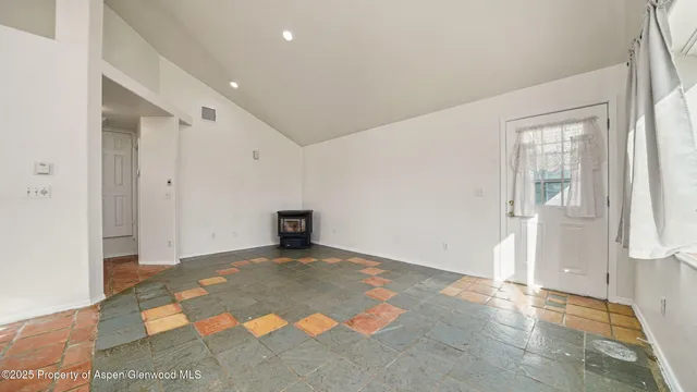 an empty room with windows