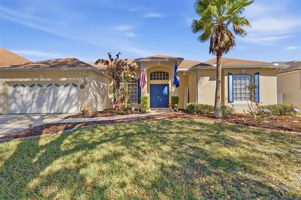 a view of a house with pool and porch
