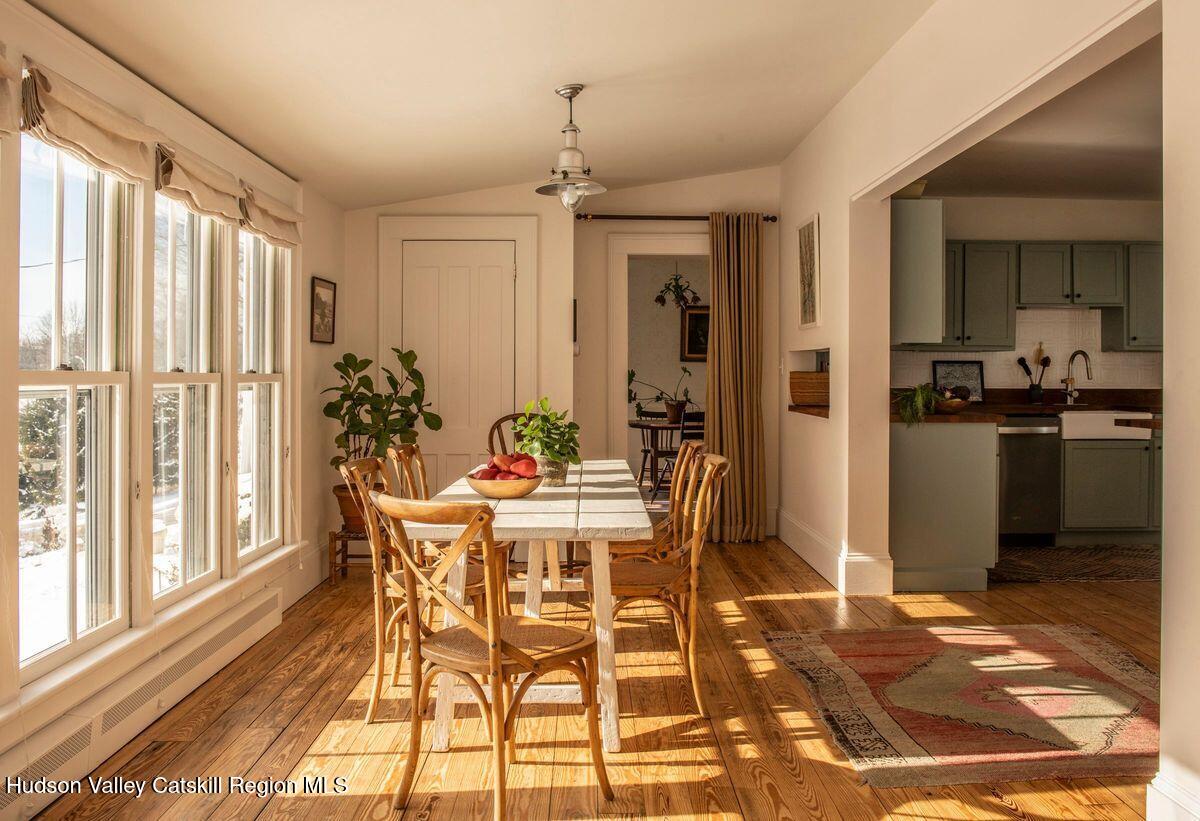 132 Decker Rd Pine Plains Ancram, NY 12502 - Photo 7 of 24 a view of a dining room with furniture and window