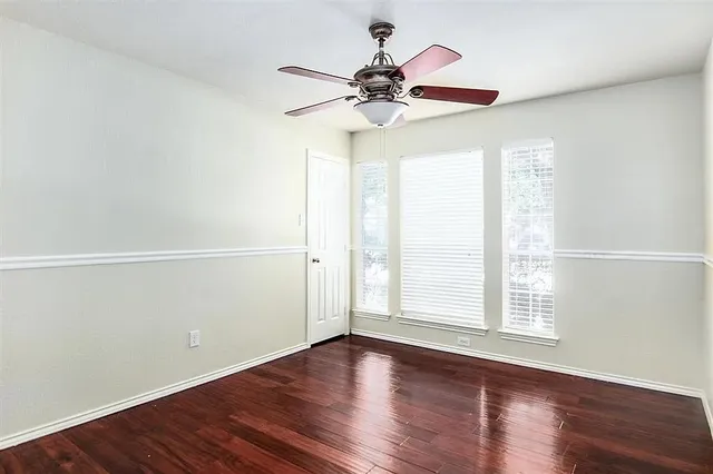 a bathroom with a sink a mirror and a window