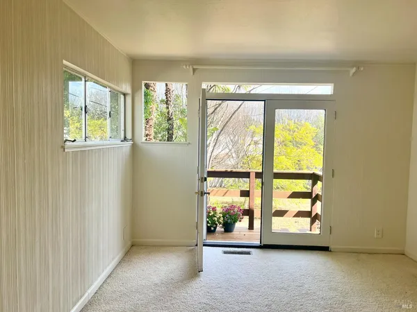 an empty room with windows