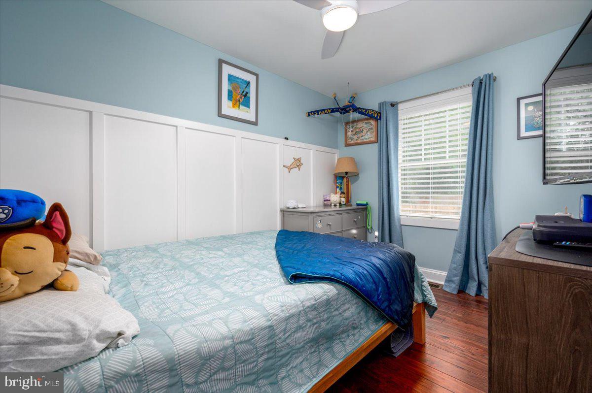57 Spa Road Annapolis, MD 21401 - Photo 16 of 39 a bedroom with a bed and a window