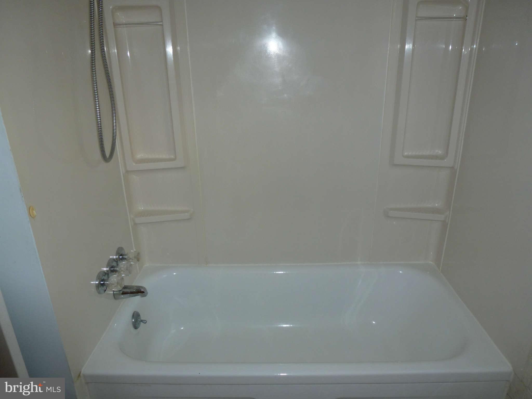 8643 Chestnut Grove Road Frederick, MD 21701 - Photo 12 of 27 Molded bath shower combo in ML full bath