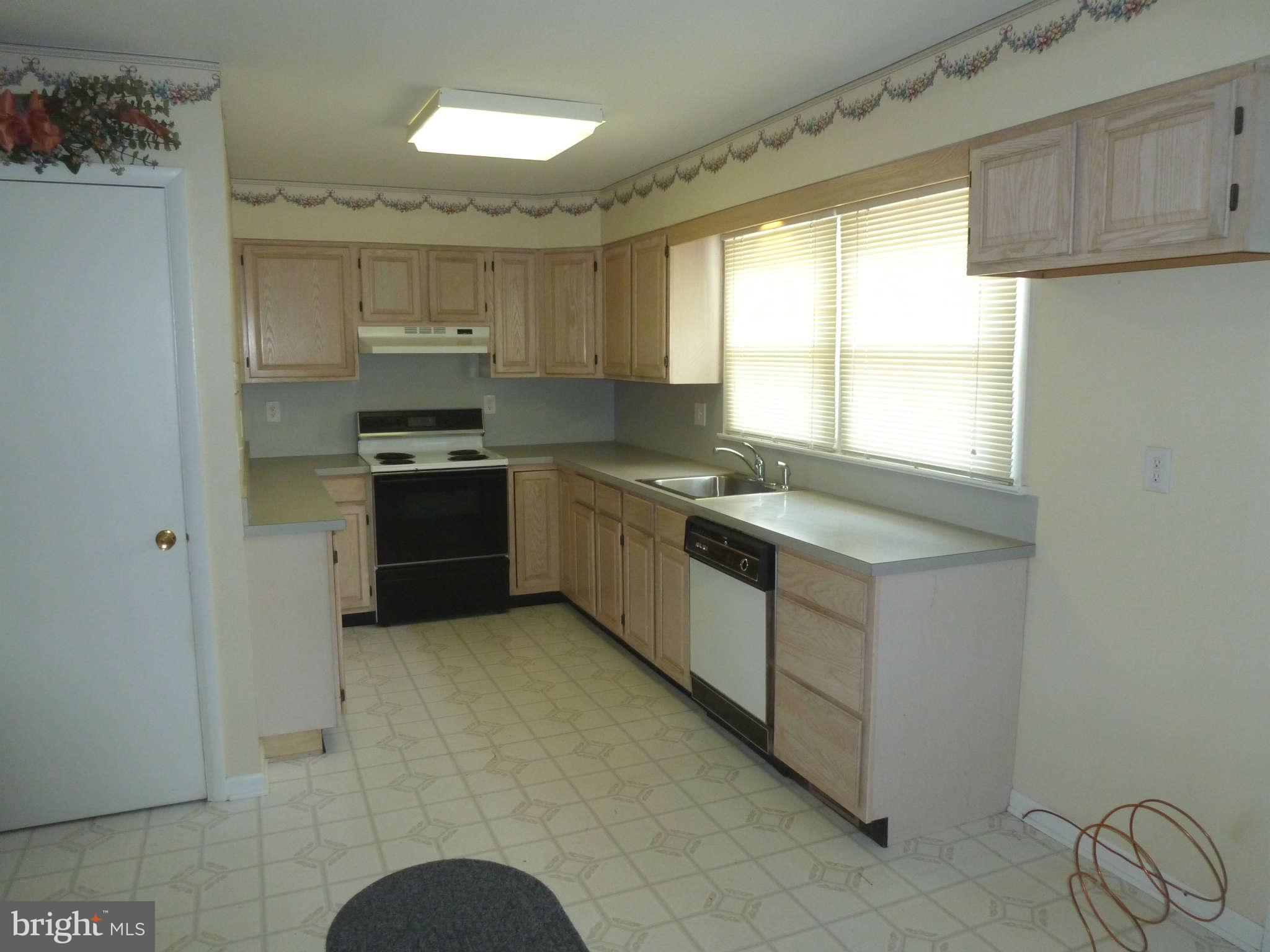 8643 Chestnut Grove Road Frederick, MD 21701 - Photo 6 of 27 Bright kitchen has lots of cabinets