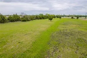 a view of a lake with a city