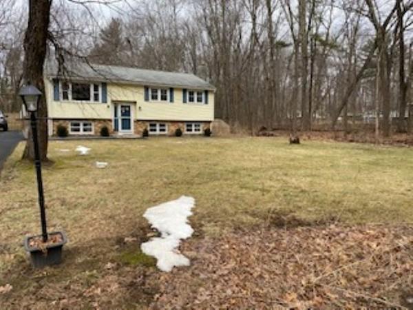 358 Sherburne Road Pelham, NH 03076 - Photo 1 of 35 a front view of a house with a yard