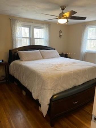 358 Sherburne Road Pelham, NH 03076 - Photo 18 of 35 a bedroom with a bed and window