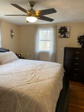 358 Sherburne Road Pelham, NH 03076 - Photo 19 of 35 a bedroom with a bed and a dresser