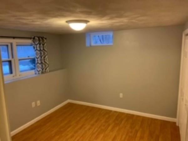 358 Sherburne Road Pelham, NH 03076 - Photo 24 of 35 a view of a room with a wooden floor