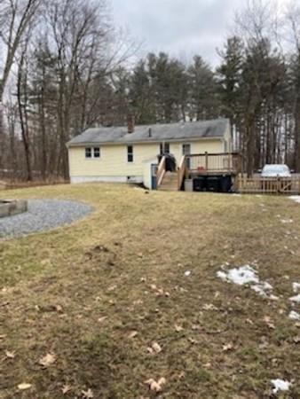 358 Sherburne Road Pelham, NH 03076 - Photo 28 of 35 a front view of a house with garden