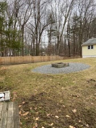 358 Sherburne Road Pelham, NH 03076 - Photo 29 of 35 a view of a yard with large trees