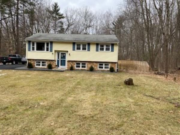 358 Sherburne Road Pelham, NH 03076 - Photo 3 of 35 a view of a house with backyard and sitting area