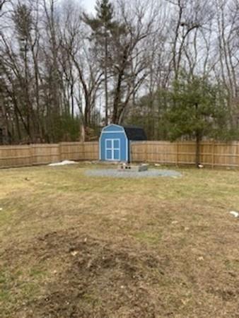 358 Sherburne Road Pelham, NH 03076 - Photo 34 of 35 a view of a yard with a trees