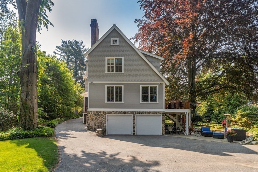 31 Percy Road Lexington, MA 02421 - Photo 23 of 25 a front view of a house with a yard