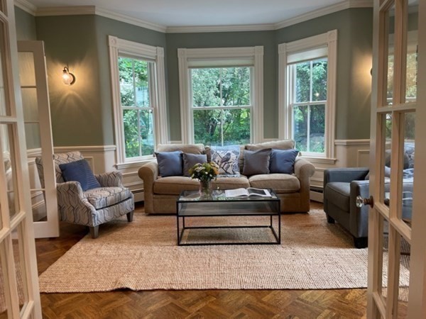 31 Percy Road Lexington, MA 02421 - Photo 7 of 25 a living room with furniture and a large window