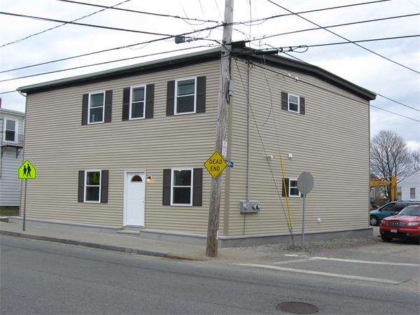 1214 Stafford Road Fall River, MA 02721 - Photo 2 of 14 a view of a house with a car parked on road