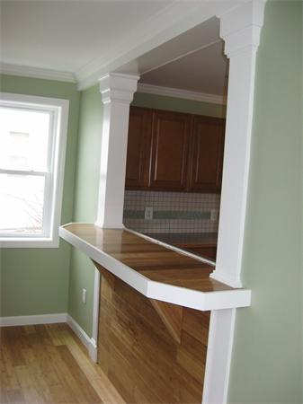 1214 Stafford Road Fall River, MA 02721 - Photo 8 of 14 a room with a window and wooden floor