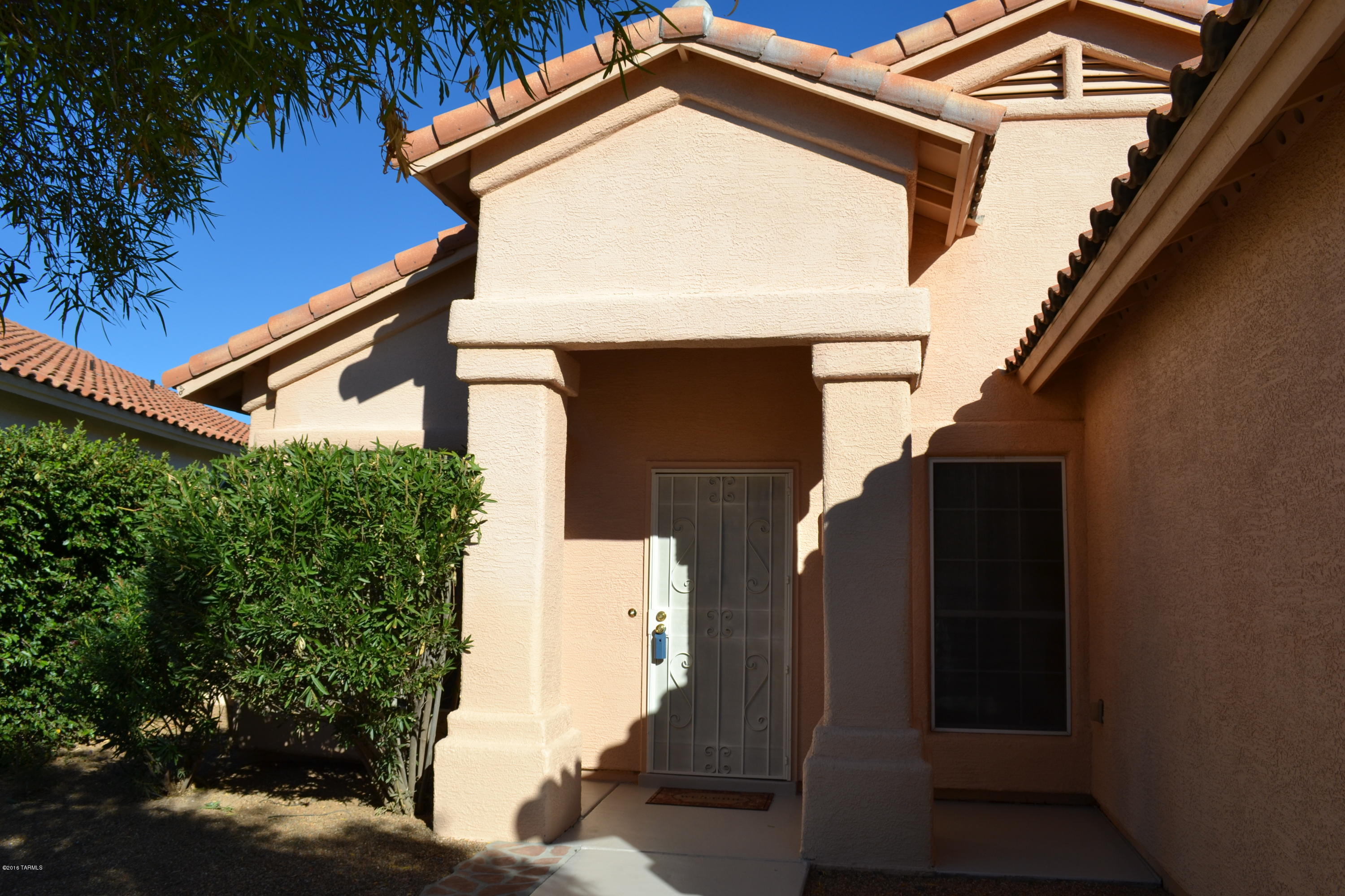 5640 North Cherokee Ridge Road Tucson, AZ 85750 - Photo 2 of 39 a view of a house with a small space