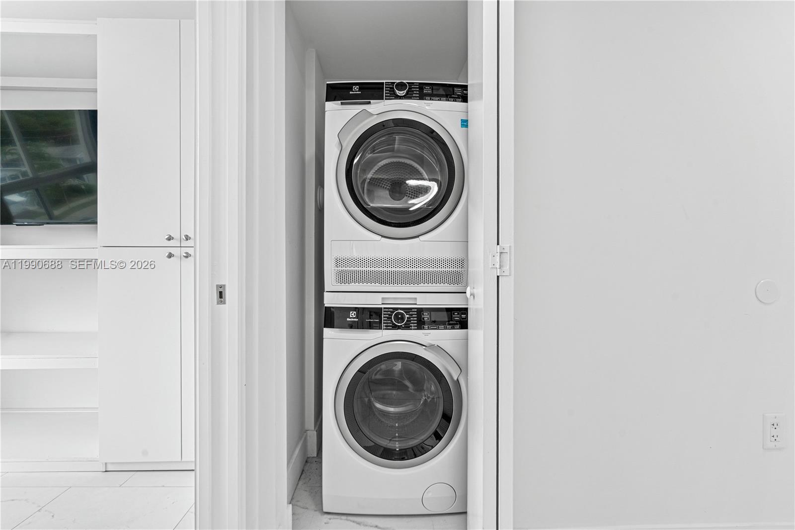 1850 Monroe Street, Unit 308 Hollywood, FL 33020 - Photo 11 of 16 a utility room with dryer and washer