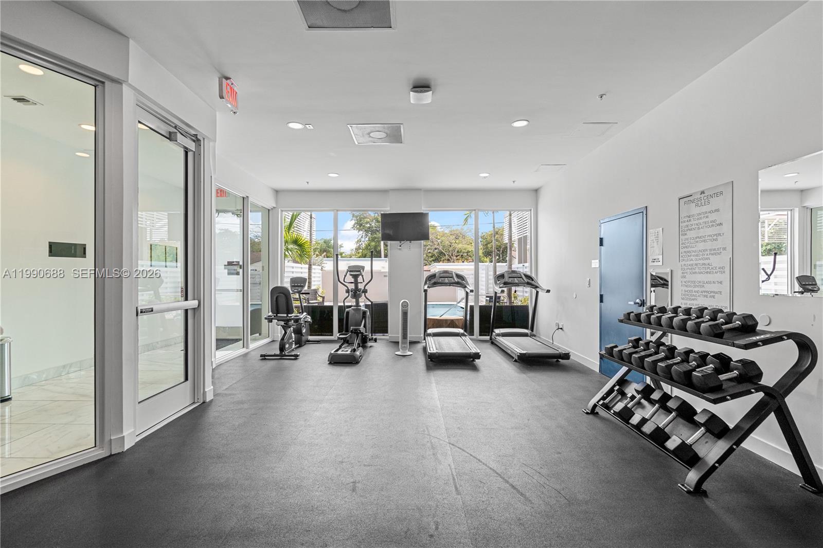 1850 Monroe Street, Unit 308 Hollywood, FL 33020 - Photo 13 of 16 a view of a room with gym equipment