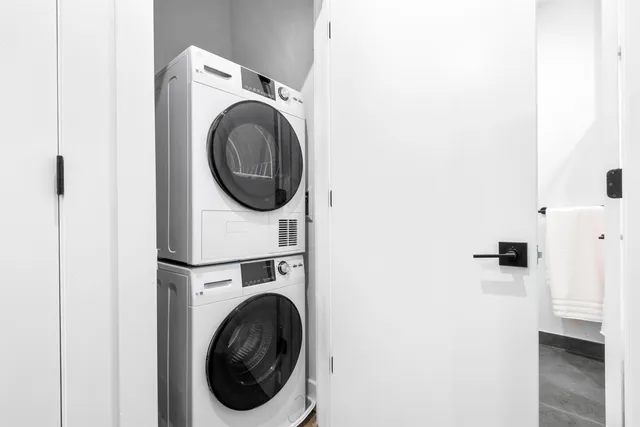 a utility room with dryer and washer