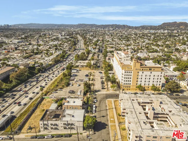 an aerial view of residential building with parking space