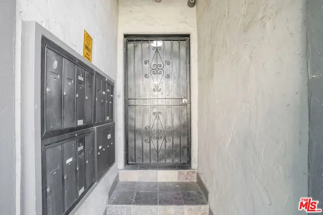 a front view of a house with parking space