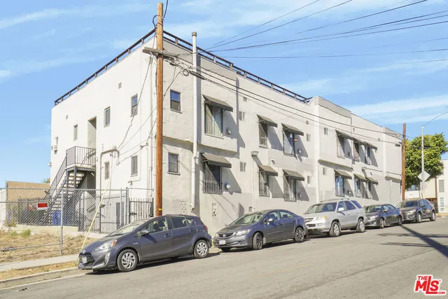 a car parked in front of a building